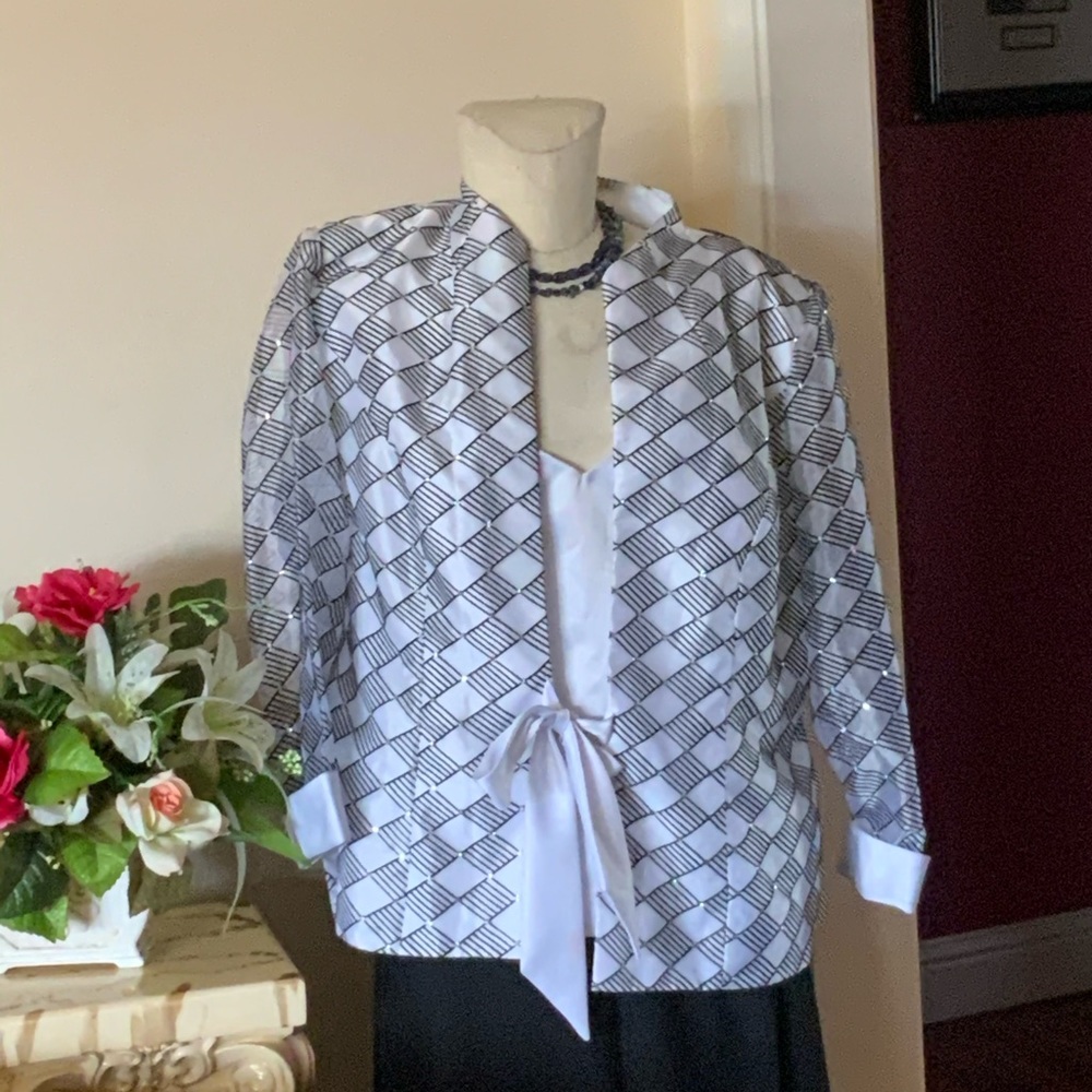 Silver glittery jacket with fitted white tank